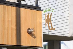 a close up of a bug on the side of a building at Kulton Moct Kenroku in Kanazawa