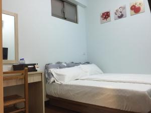 穀鄉民宿客房内的一张或多张床位