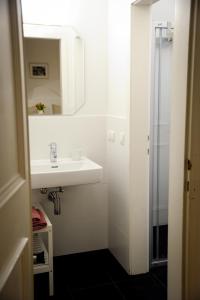 Ванная комната в City Center Apartment