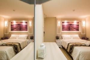 Postel nebo postele na pokoji v ubytování Lavender Inn USJ