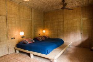 Postel nebo postele na pokoji v ubytování Lisu Lodge