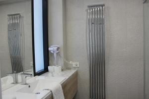 Koupelna v ubytování Hotel Merops Mészáros