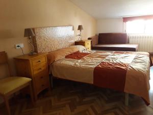 Posteľ alebo postele v izbe v ubytovaní Apartamento Turístico Sigüenza