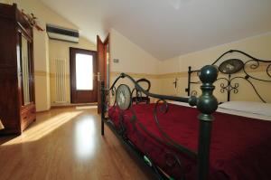 Łóżko lub łóżka w pokoju w obiekcie Locanda Sant'Anna Hotel