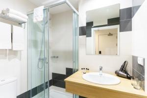 Koupelna v ubytování Hotel Concheiros