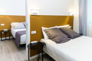 Cama o camas de una habitación en Hotel Concheiros