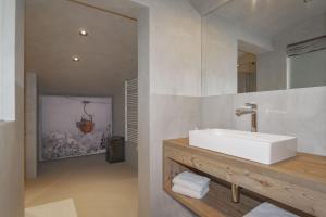 Koupelna v ubytování Appartements Erwin & Eleonore Hüttl - Penthouse + 21 fotografií