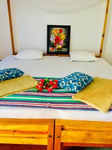 Postel nebo postele na pokoji v ubytování Beach Cab Resort