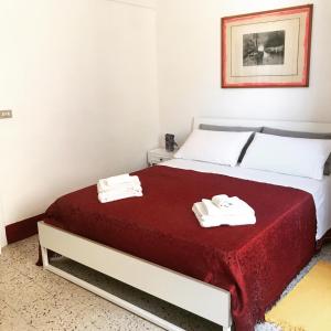 Кровать или кровати в номере Corte dei Mesagnesi