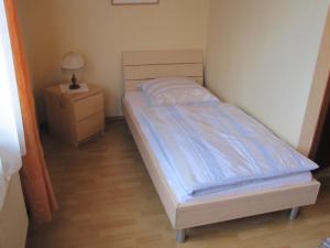 Postel nebo postele na pokoji v ubytování "Unter den Kastanien"