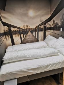 Postel nebo postele na pokoji v ubytování Boutique Hotel BS16 before Bern City Parking gratis