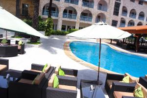 Der Swimmingpool an oder in der Nähe von Riviera Taouyah Hotel