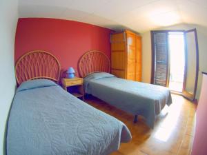 Posteľ alebo postele v izbe v ubytovaní VACAY Villa Lin, aire libre y piscina! en la Costa Brava, L'Escala! + 11 fotografií