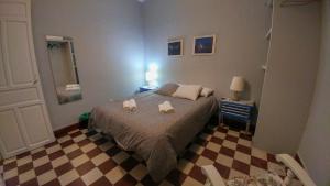Postel nebo postele na pokoji v ubytování Apartamento Plaza de Doña Elvira 8