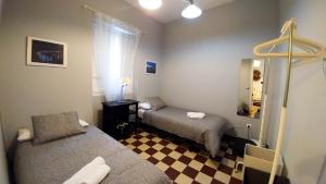 Postel nebo postele na pokoji v ubytování Apartamento Plaza de Doña Elvira 8