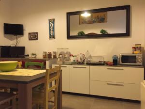 A kitchen or kitchenette at YooRoom