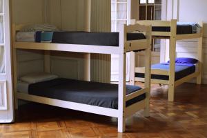Dviaukštė lova arba lovos apgyvendinimo įstaigoje Be King Hostel