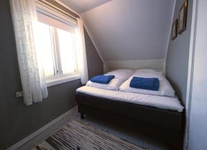 Postel nebo postele na pokoji v ubytování Beach View Lofoten