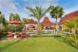 an image of a villa with a swimming pool at Villa Nico in Canggu