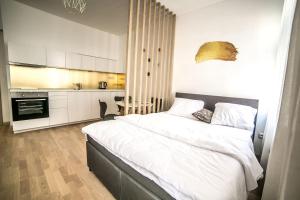 Кровать или кровати в номере Prague friendly apartments in Prague