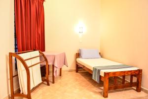 Postel nebo postele na pokoji v ubytování Hotel Apollo