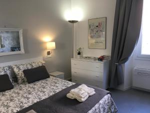 Łóżko lub łóżka w pokoju w obiekcie Klee House Trastevere