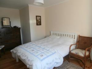 Кровать или кровати в номере Valley View Cottage