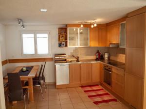 Kuchyň nebo kuchyňský kout v ubytování Chalet Fletschhorn