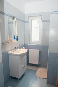 Kúpeľňa v ubytovaní Deluxe Apartments