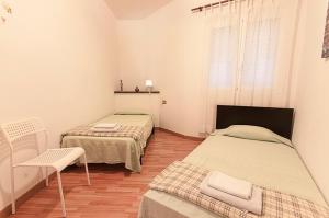 Postel nebo postele na pokoji v ubytování Céntrico y tranquilo apartamento con WIFI + 35 fotografií