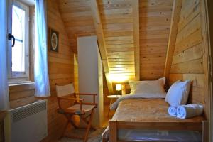 Postel nebo postele na pokoji v ubytování Mountain Lodge Mont Peace