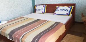 Postel nebo postele na pokoji v ubytování Bis Hotel