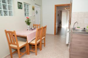 Kuchyňa alebo kuchynka v ubytovaní Deluxe Apartments