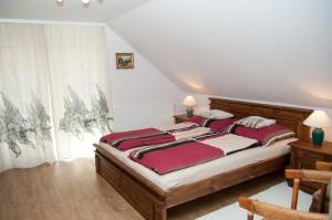 Posteľ alebo postele v izbe v ubytovaní Deluxe Apartments