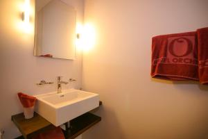 Un baño de Boutique Hotel - Restaurant Orchidee