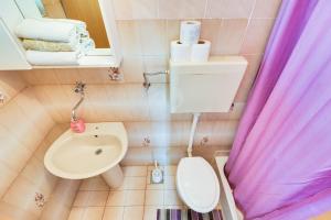 Koupelna v ubytování Apartments Kronja
