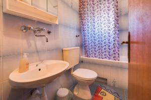 Koupelna v ubytování Apartments Kronja