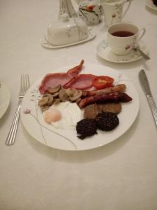 a plate of food on a table at Abbeyview House in Abbeyshrule