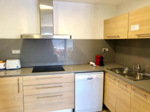 Kuchyňa alebo kuchynka v ubytovaní Apartament Familiar Av. Tarragona