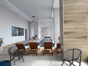 Prostor za sedenje u objektu Flat Aconchego, próximo ao centro de Osasco, ar condicionado, academia, piscina, wifi e varanda