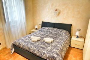 A bed or beds in a room at Appartamento Luna 36 in centro a Firenze