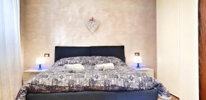 A bed or beds in a room at Appartamento Luna 36 in centro a Firenze