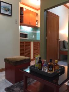 Kuchyň nebo kuchyňský kout v ubytování Las Pinas Serviced Apartment