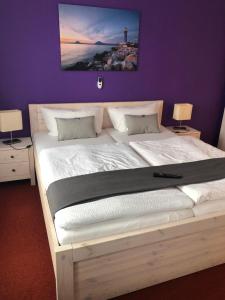 Postel nebo postele na pokoji v ubytování City-Hotel-Wolgast