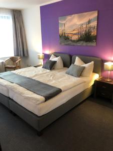 Postel nebo postele na pokoji v ubytování City-Hotel-Wolgast