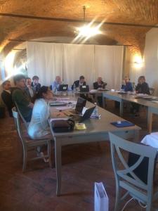 a group of people sitting at a table with laptops at Corte Breda, Agriturismo Bed&Breakfast in Chiari