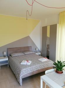Postel nebo postele na pokoji v ubytování Casa Zelia