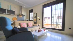 Ruang duduk di Living-Sevilla Apartments San Lorenzo