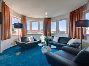 Ein Sitzbereich in der Unterkunft Skycity Hotel Atrigon