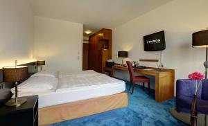 Ein Bett oder Betten in einem Zimmer der Unterkunft Skycity Hotel Atrigon